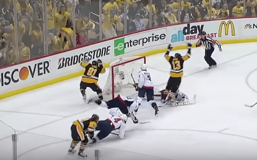 Penguins halt Capitals' win streak at 9 in wild 8-7 victory